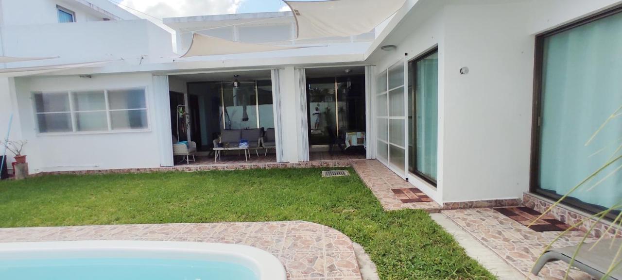 Casa Abril Cozzy Suites Канкун Экстерьер фото